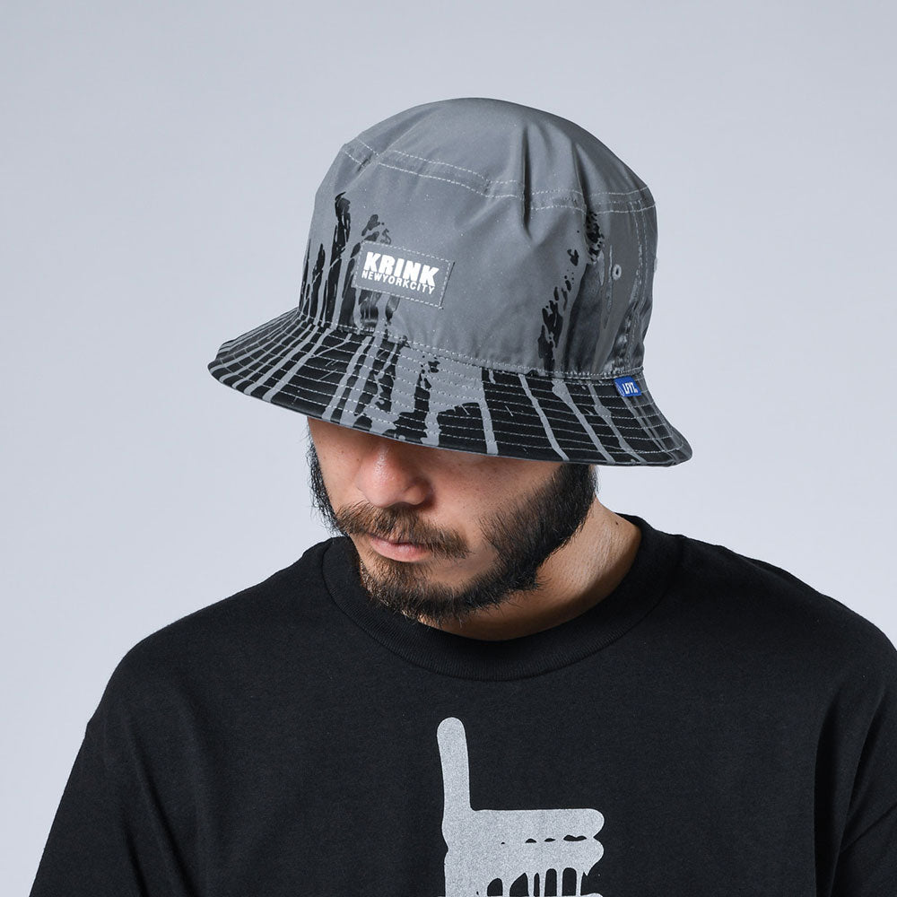 × KRINK Reflector Dripping Bucket Hat クリンク リフレクター ドリッピング バケット ハット